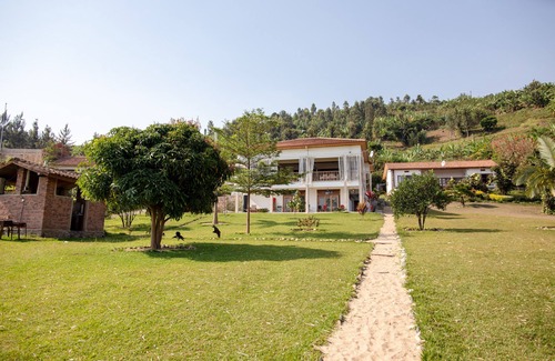 Buhongo House | Room in Lodge - Find a Quiet Beach Resort at Rushel Kivu Resort!