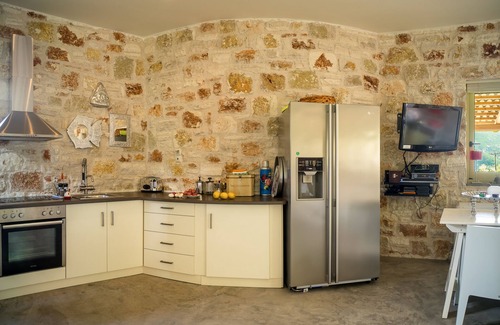 Evgiros Villa | Rose Tower Luxury stone tower villa in the middle of nature with stunning view.