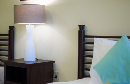 Penestanan House | Rumah Ganesha-Twin bedroom with tropical serenity in the ubud center