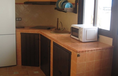 Fuentes de Leon House | Rural apartments Los Molinos - wooden house