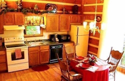 Rocky Grove Cabin | Rushing Waters Cabin- A Romantic Creek Side Retreat with Waterfalls