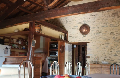 La Tardiere Cottage | Rustic 18th Century Stone Cottage with Eco-Friendly Restorations, Terrace, and Playground