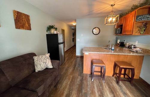 Solon Springs Apartment | Rustic Suite on the Lake: Cozy Comfort with Unmatched Sunrises.