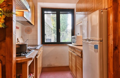 Cecina Apartment | Rustico Cecina by Theater Home, with big closed garden