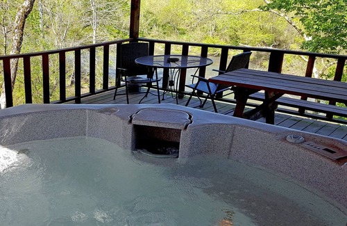 Battiest Cottage | Safari on Glover River With Private Riverfront Access and Hot Tub by Redawning