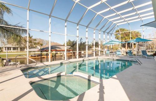 Palm Harbor House | Salt Water Canal Home with Pool