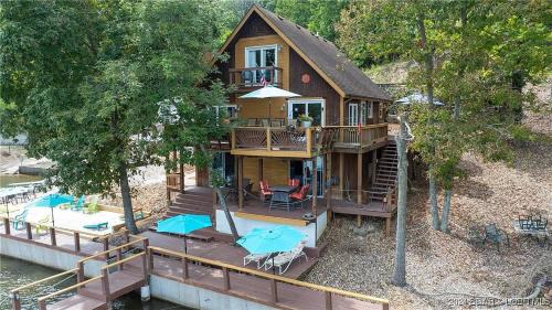Stover House | Sandy beach water toys great dock