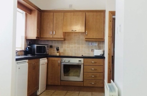 Downings House | Sandy Hills Cottages, overlooking Rosapenna Golf Resort and Tramore Beach