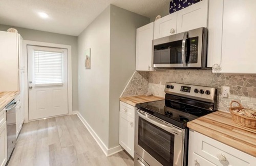Bayou Oaks House | Sarasota Beach House themed designer cottage- sleeps 6 - pool- tropical oasis.