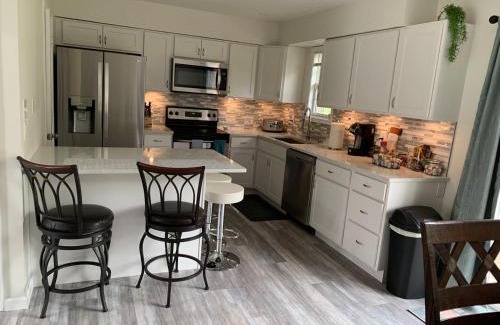 Elizabethtown House | School Village Walk-in shower and jetted tub