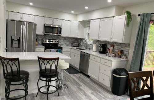 Elizabethtown House | School Village Walk-in shower and jetted tub