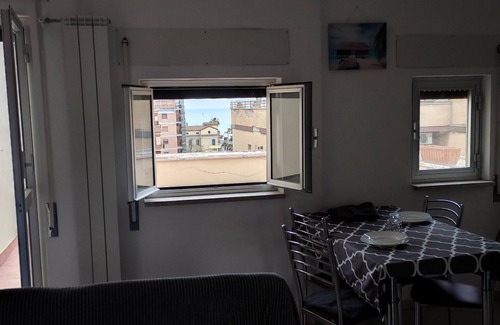 Quartiere XXXIV Lido di Ostia Levante Apartment | Sea view terrace 300 meters from the beach. and for the winter the fireplace.