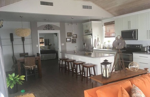 Crescent City Cottage | Seas the Day Cottage is built over the water for fantastic fishing & lake views.