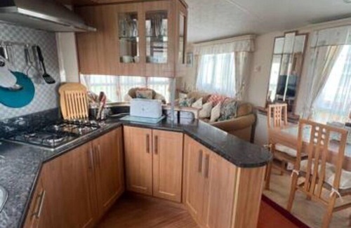 Llanrhystud House | Seaside Bliss for the Family: Spacious Caravan by the Sea, Sleeps 4, Perfect for Kids