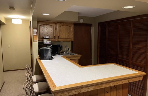 Rodman Apartment | Secluded Apartment Overlooking Ponds with Hot Tub, Fireplace and Game Room!