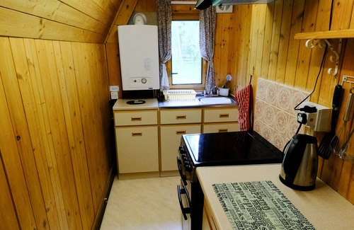 Beauly Ski Chalet | Secluded, cosy cottage on the banks of a Highland river
