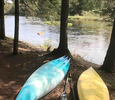 Hopkinton House | Secluded River Overlook Cabin on 160 acres.