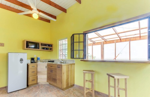 Dangriga Cabin | Secluded seaside cabana with beach access, ocean view, hammock & partial AC