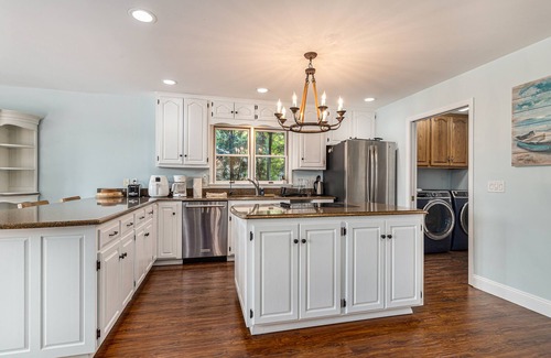 Berrien Springs House | Serene lakefront retreat with an expansive deck, dock access, game room, & AC