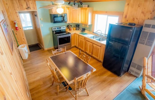 Puposky Cabin | Serene Lakefront Cabin - Steps from Big Turtle Lake