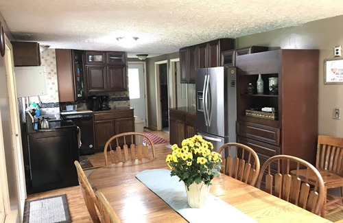 Wolcott Cottage | Serene Port Bay Cottage: waterfront, 3 kayaks, pedal boat, fire pit, grill, ac