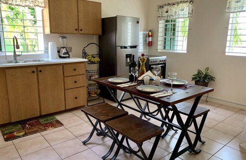 Constant Spring Apartment | "Serenity". Peaceful work-friendly, self-contained suite with mountain view.