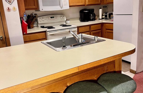 White House | Seven Springs ski in, ski out two bedroom and loft for year round fun.