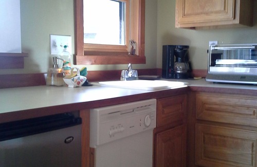 Friday Harbor Apartment | Shared hot tub with meadow view