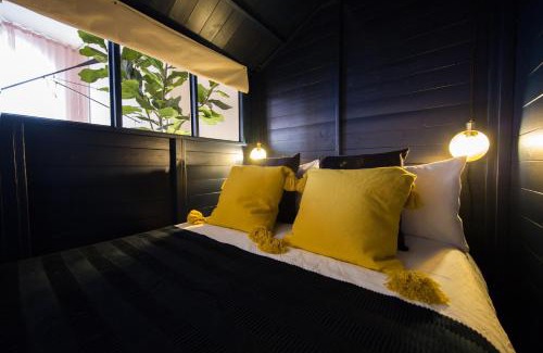 Shoreditch Apartment | Shoreditch Loft w 100inch Cinema, Premium Mattress & Hammock, by the Design Traveller