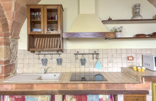 Castel San Gimignano Apartment | SIMONA STUDIO WITH PRIVATE GARDEN AND STUNNING VIEW
