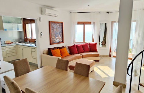 Sitges Apartment | Sitges. Mediterranean Balcony. Amazing views. Beach and pool. A/C. Parking. WIFI