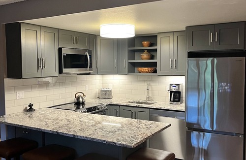 Peak 9 Condo | Ski in and out the back door, New Kitchen Remodel, Permitted Parking and Hot Tub