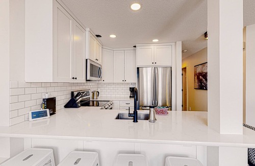Snow Pine Estates House | Ski-in/out condo with mountain view, wifi, fireplace, & private washer/dryer