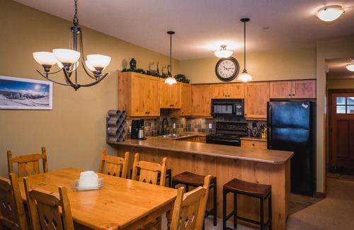 Sun Peaks Condo | Ski in Ski out condo with private Hot Tub backing on Golf course. 2 bed 2 bath.