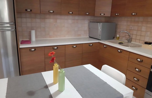 Perama Apartment | Skyline Vista - Unique top floor apartment - Unlimited sea view and free parking