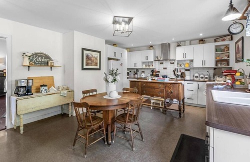 Clinton House | Sleeps 13, Restored Farmhouse at Red Sands Golf Course