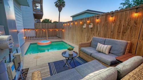 Port Aransas House | Sleeps 22 2 Homes w Private Pool Patio Walkable Location Golf Cart Zone