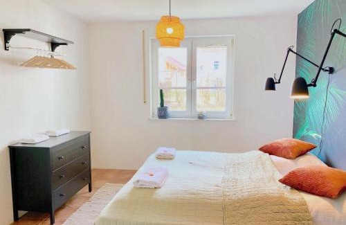 Wessling Apartment | Snug Stays 1 I 3-Zimmer Design Apartment am See mit Garten I Home Office I Highspeed Wifi