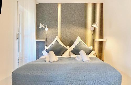 Worthsee Apartment | Snug Stays 2 - Design 1-Zimmer-Studio am See mit Terrasse, Garten, Badestelle vor dem Haus