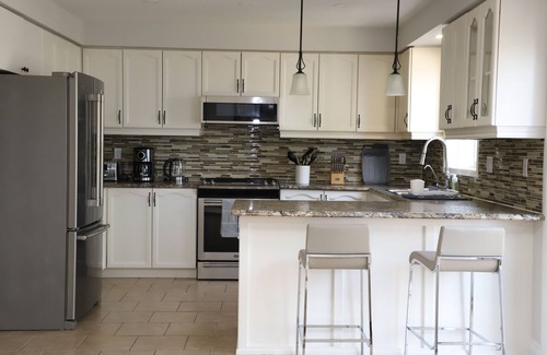 Alcona House | Soléra — A Light-Filled Minimalist Escape Near Beaches & Golf