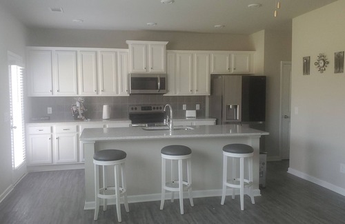 Newnan House | Sought after Ashley Park. Walking Trails. Golfing. Shop. Dine. Play and Relax