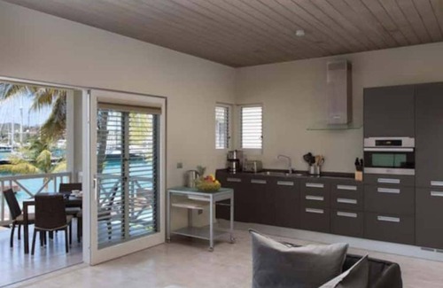 English Harbour Condo | SouthPoint Deluxe suite with ocean & marina view