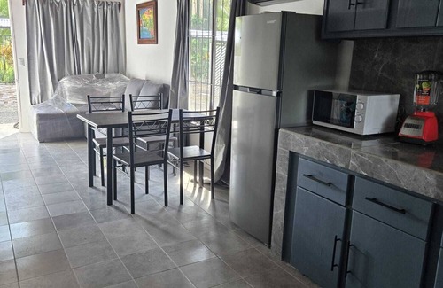 Palma House | Spacious 2 bedroom beach house with AC WIFI BBQ Terrace and car port