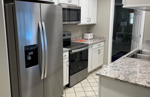 Indian Waters House | Spacious 3 BR 2 Bath House On Deep Canal With Screened Heated Pool