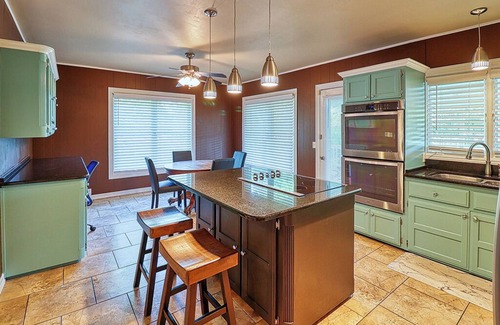 McAlester House | Spacious 4-Bedroom Historical Home w/modern comforts in Old Town McAlester, OK.