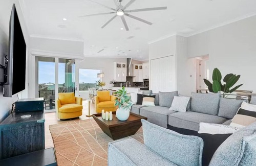 Palm Coast House | Spacious 5-bedroom house on water, beach access, hot tub, elevator, game room!