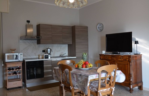 Viadanica Apartment | Spacious apartment with panoramic terrace 10 minutes from Lake Iseo.