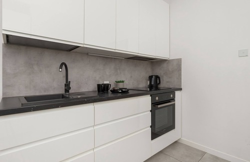 Piecki-Migowo Apartment | Spacious Apartment with Parking | Gym | Smart TV | Remote working | WiFi