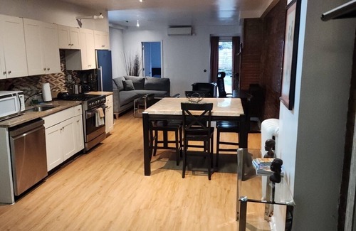 Harlem House | Spacious Harlem Brownstone Garden 2-Bedroom Apartment with a large rear yard,