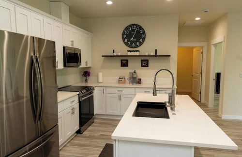 Longview House | Spacious home and lower level condo with outside entrance.